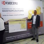 Kyocera: Spendenübergabe an die Organisation "GlücksPaten"