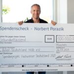 20210804_Norbert Porazik mit Spendenscheck-c5b5b737