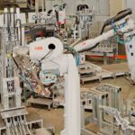 Sonderanlage zum Montieren von Anbauteilen in einer automatisierten Roboterzelle: Bildquelle: Hanomag Aluminium Solutions GmbH