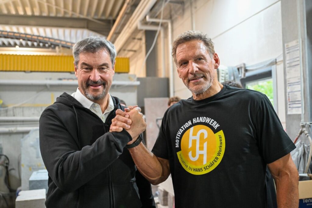 Ministerpräsident Markus Söder und Schauspieler Ralf Moeller (© Hans Schäfer Workwear)